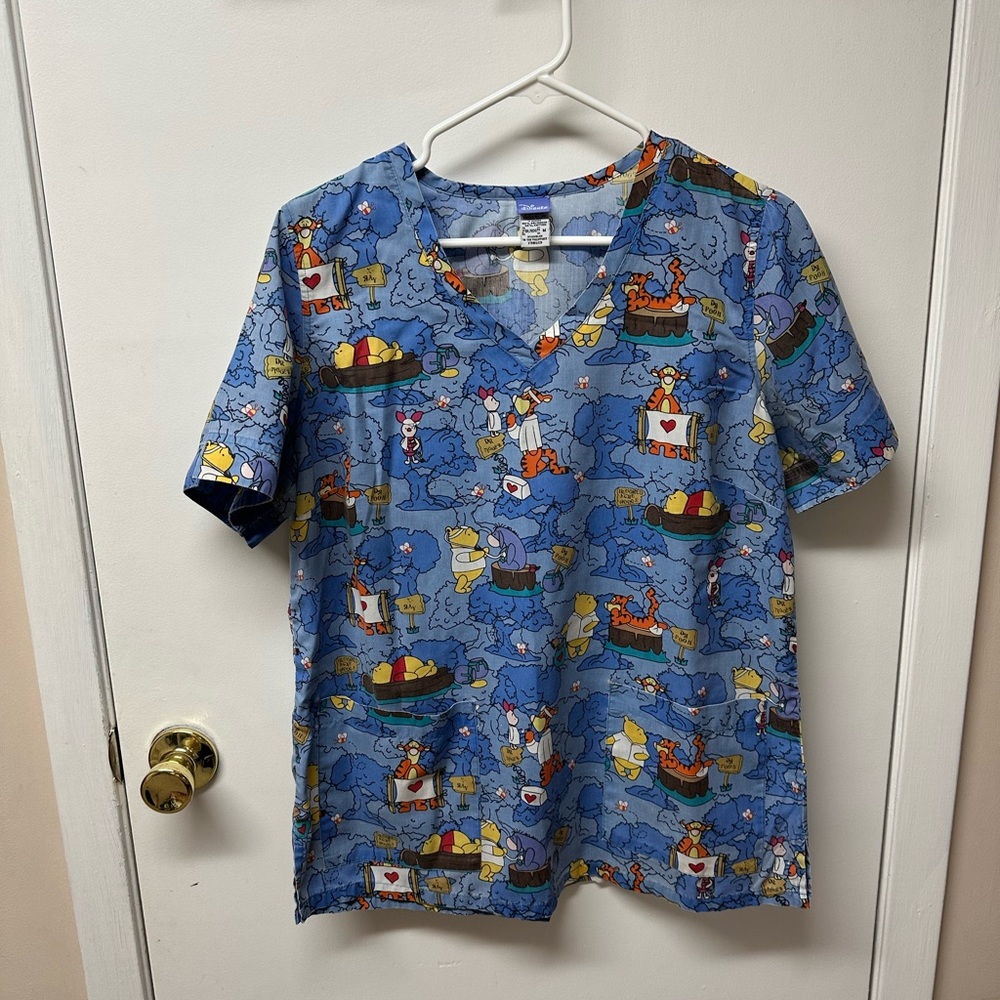 Women’s scrub top, excellent condition.